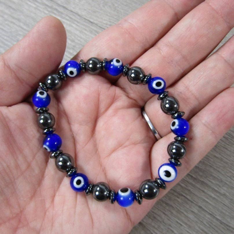 Evil Eye  & Hematite. 8 mm Lamp Glass Bracelet