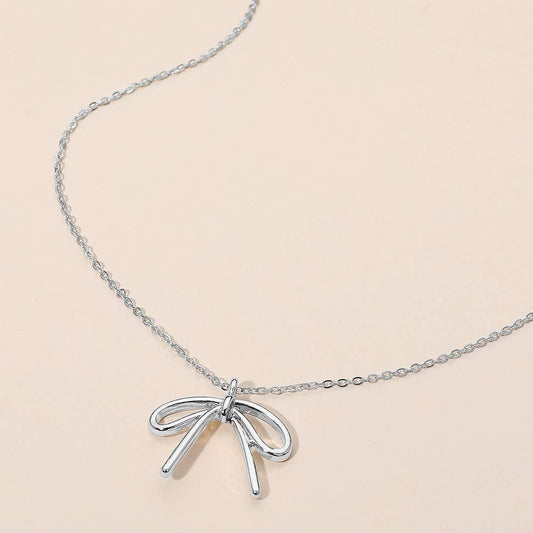 Metal Bow Pendant Necklace - Stardust & Moonstone